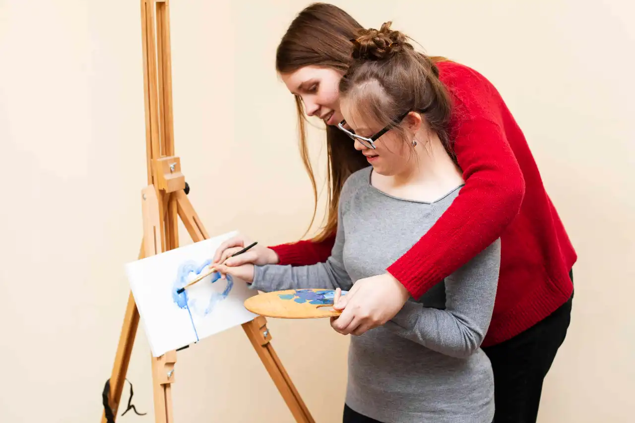 Disability Support Worker helping in Daily activities like hobbies